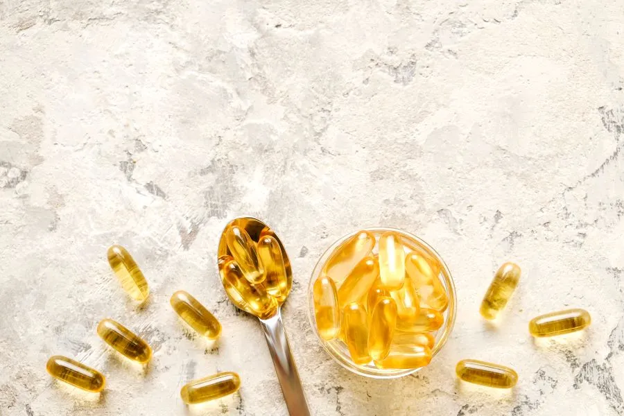 omega 3 supplements on marble table